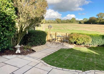 Patio, chairs, table, paved pathway